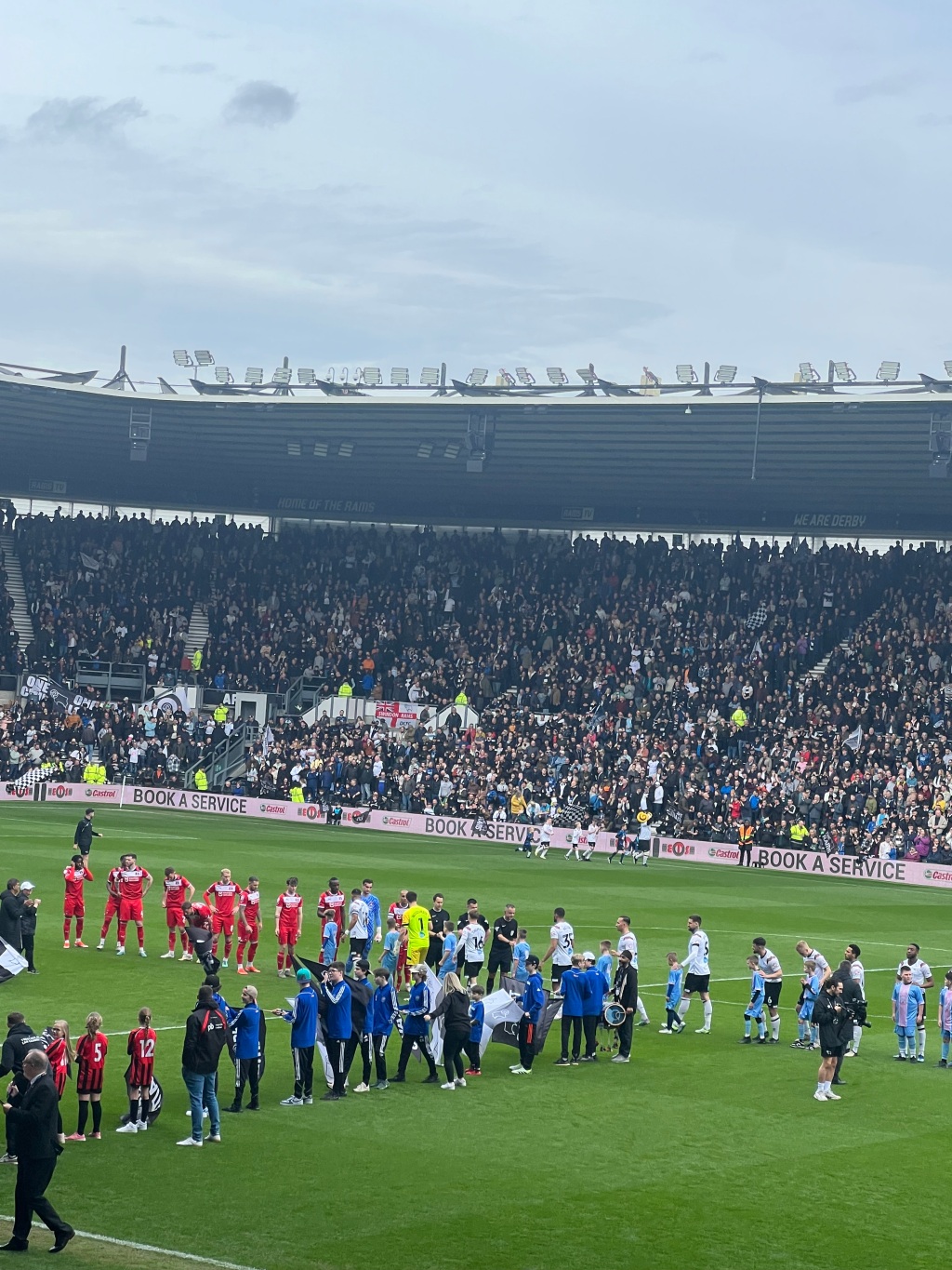 The Derby County and Leyton Orient players lining up for the pre-match necessities ahead of the game at Pride Park.